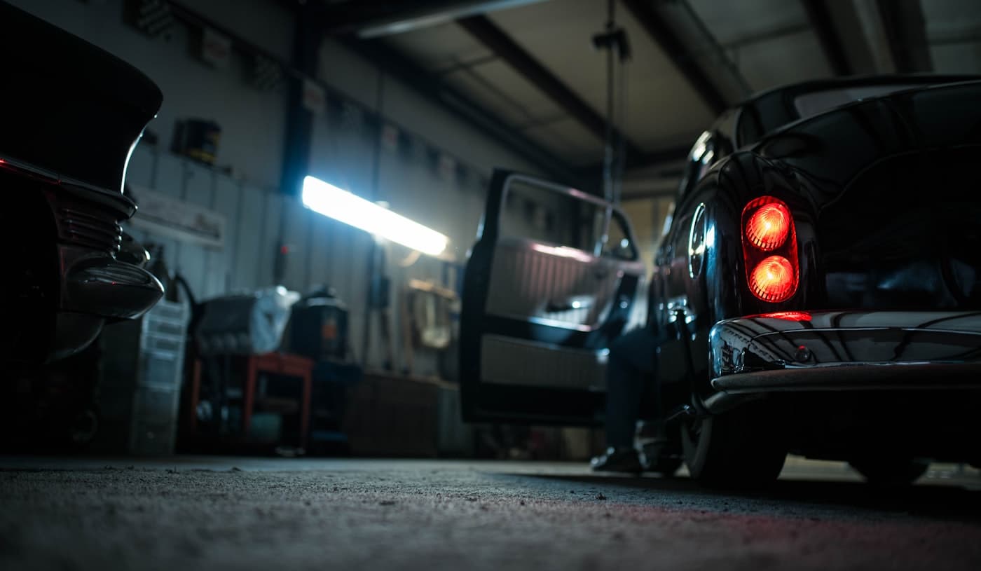 Cars in a working garage bay